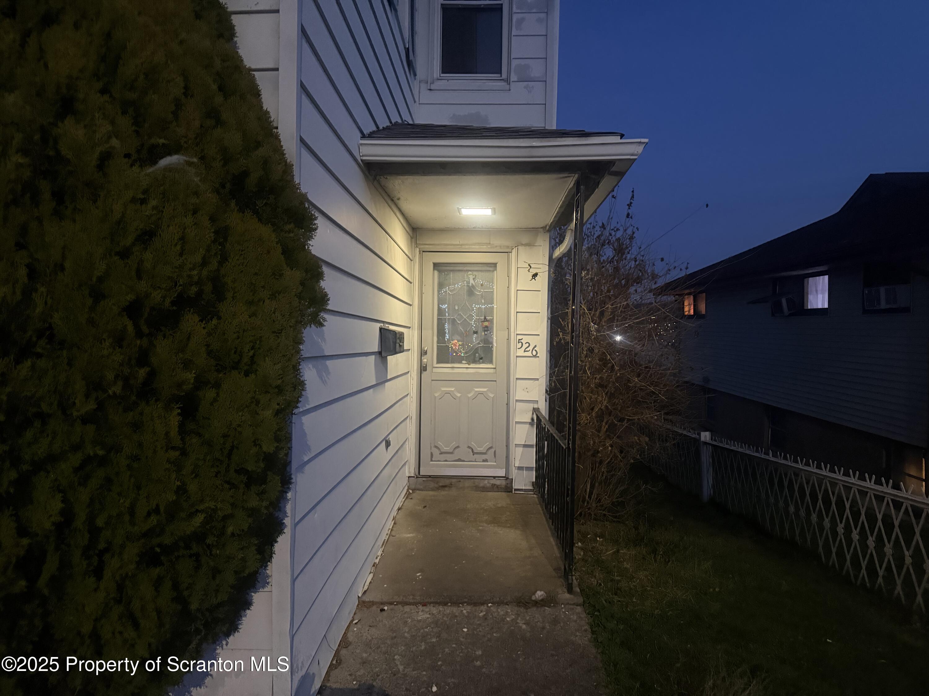526 North Fillmore Avenue Scranton, PA 18504 - Photo 2 of 6 a view of a pathway along the building