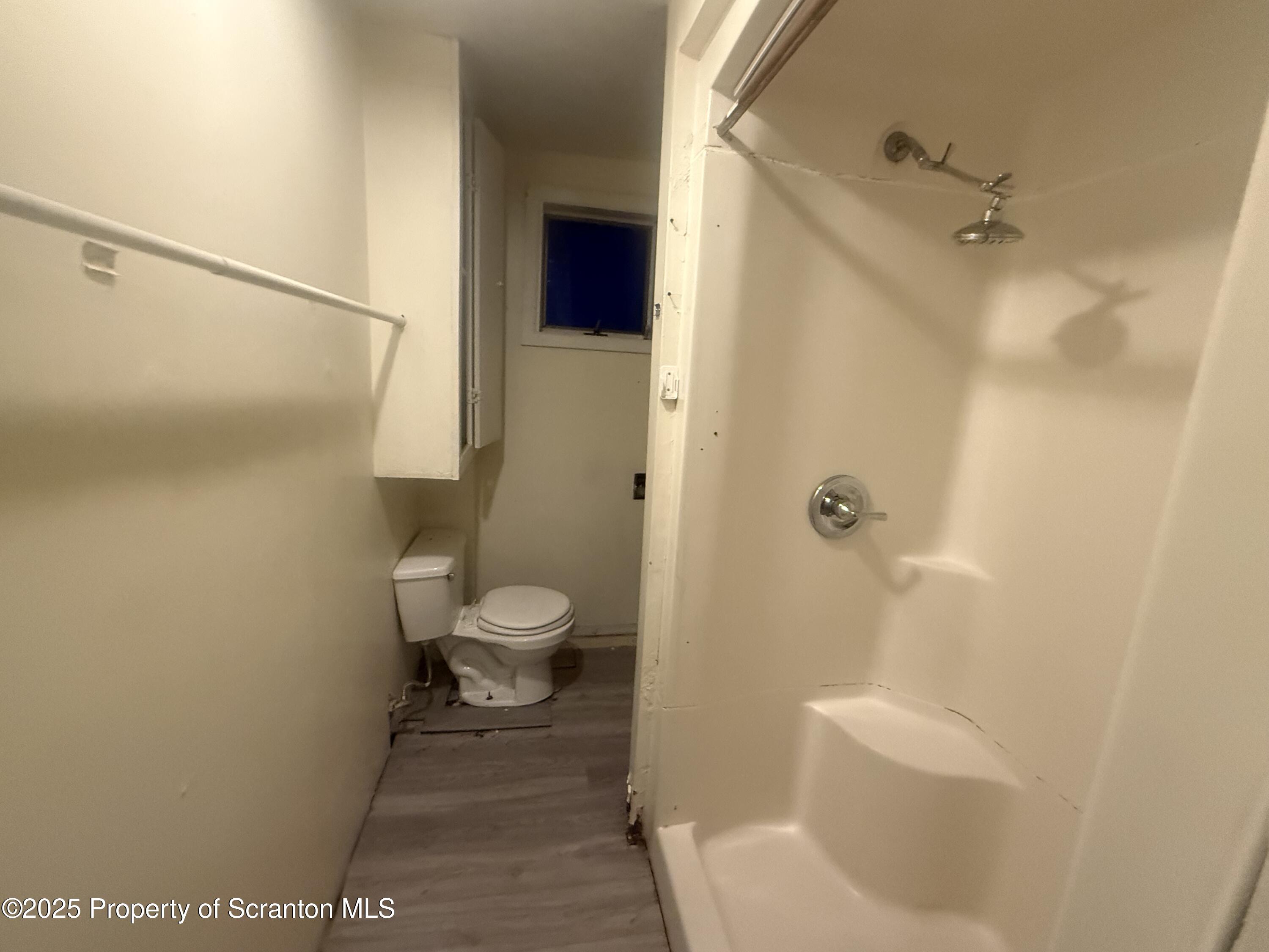 526 North Fillmore Avenue Scranton, PA 18504 - Photo 5 of 6 a bathroom with a toilet and a shower