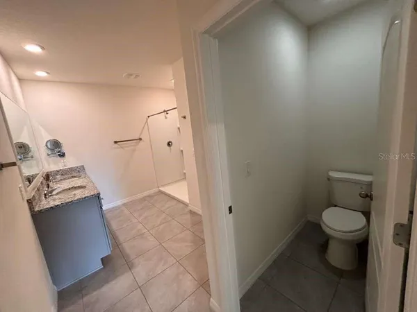 a bathroom with a sink and a toilet