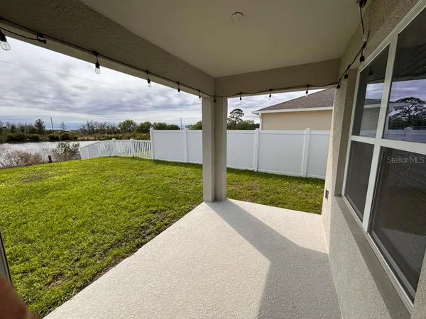 a view of a balcony with ocean view