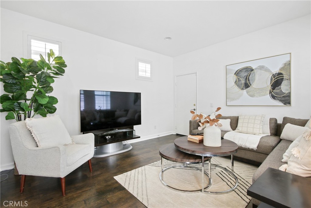 9 Paddock Place Ladera Ranch, CA 92694 - Photo 11 of 25 a living room with furniture and a flat screen tv