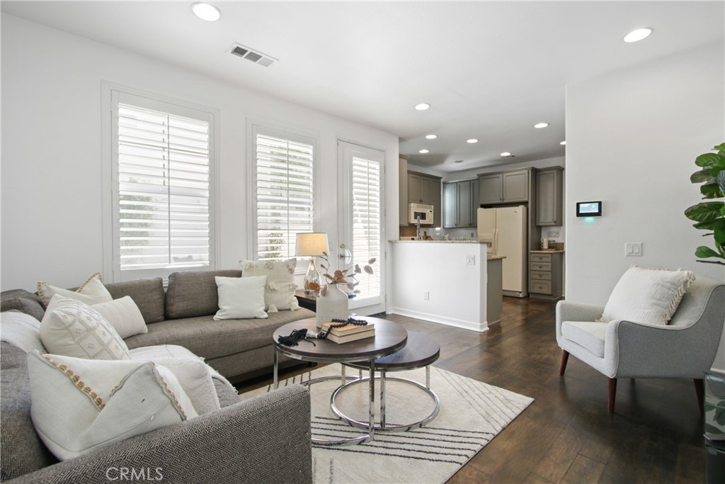 9 Paddock Place Ladera Ranch, CA 92694 - Photo 6 of 25 a living room with furniture and a large window