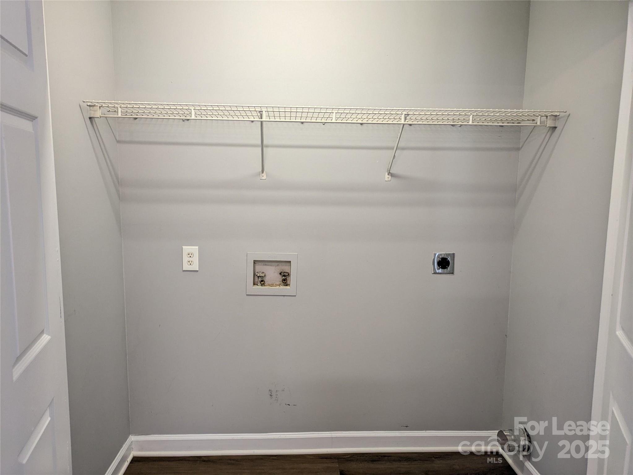 149 McKendree Road Mooresville, NC 28117 - Photo 15 of 21 a view of a room with racks on the wall