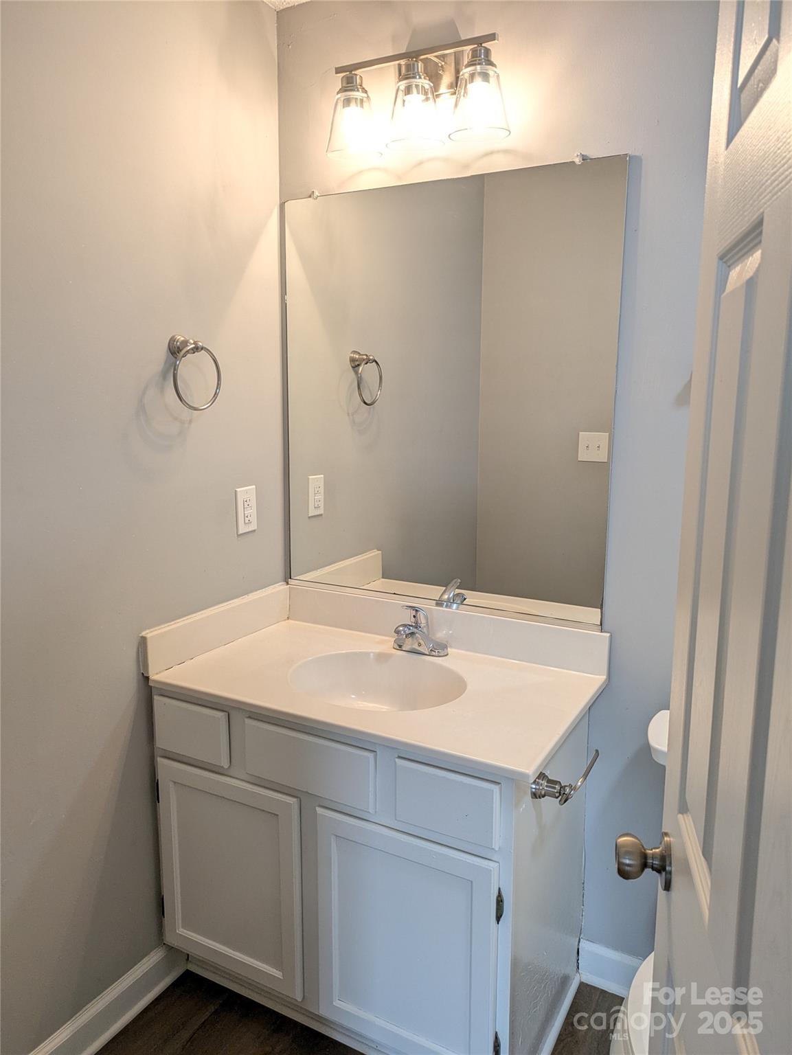 149 McKendree Road Mooresville, NC 28117 - Photo 19 of 21 a bathroom with a sink vanity and a mirror