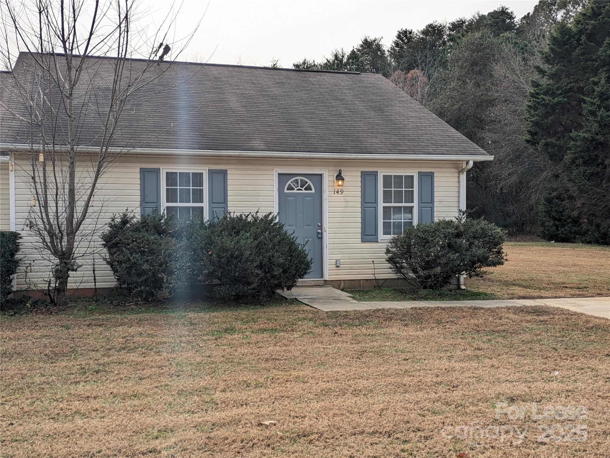 149 McKendree Road Mooresville, NC 28117 - Photo 2 of 21 a front view of a house with garden