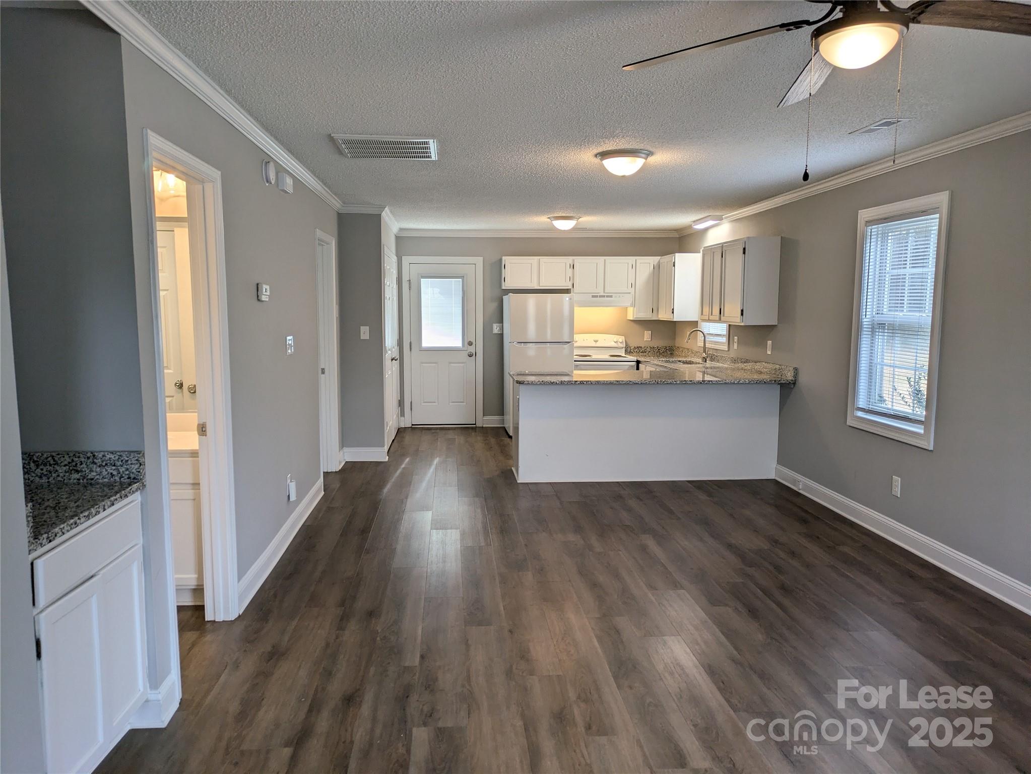 149 McKendree Road Mooresville, NC 28117 - Photo 5 of 21 a view of kitchen with sink and wooden floor