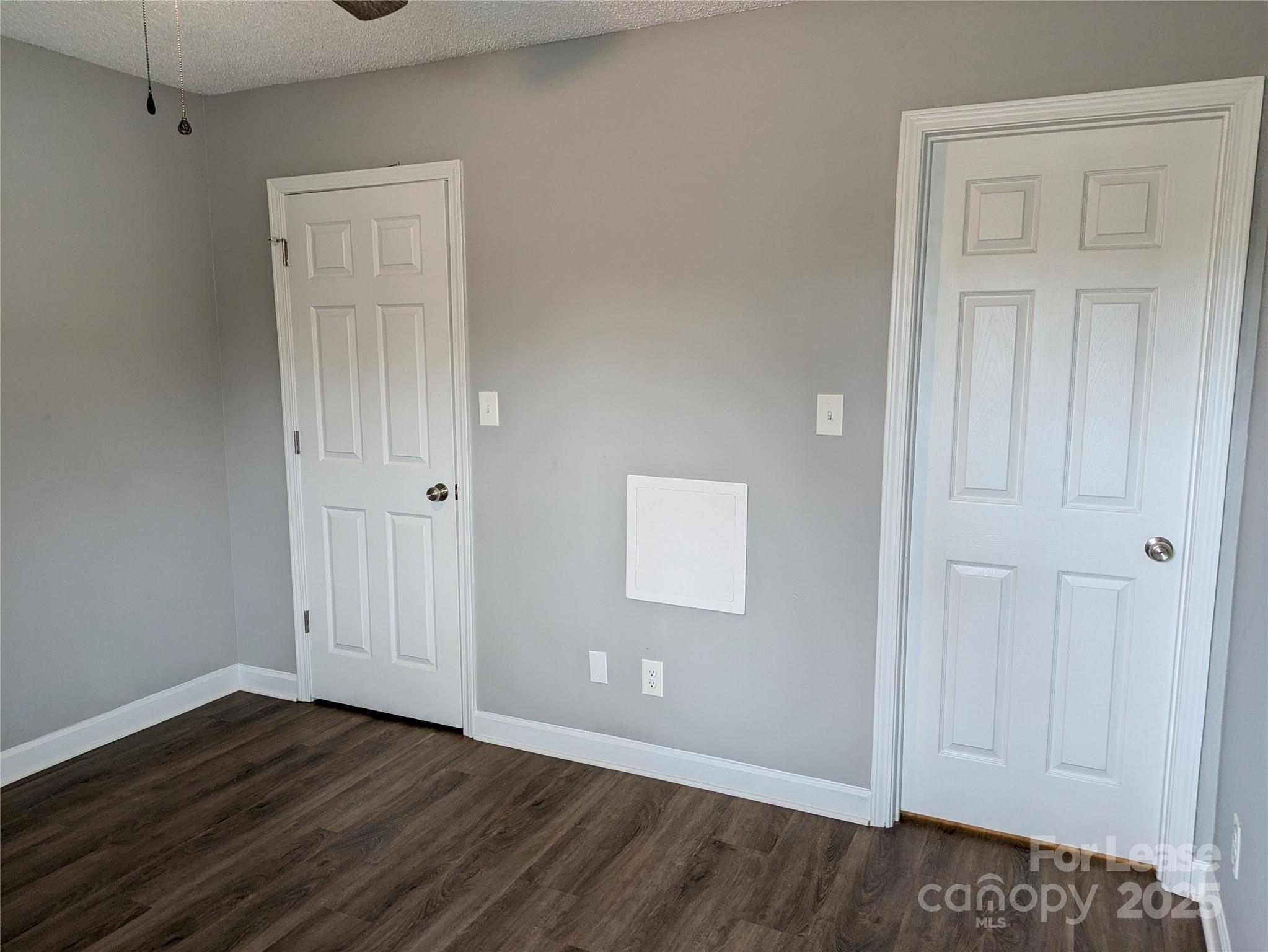 149 McKendree Road Mooresville, NC 28117 - Photo 7 of 21 a view of an empty room and wooden floor