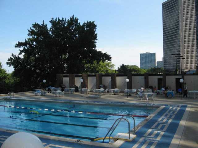 5445 North Sheridan Road, Unit 2005 Chicago, IL 60640 - Photo 6 of 19 a view of pool table and chairs