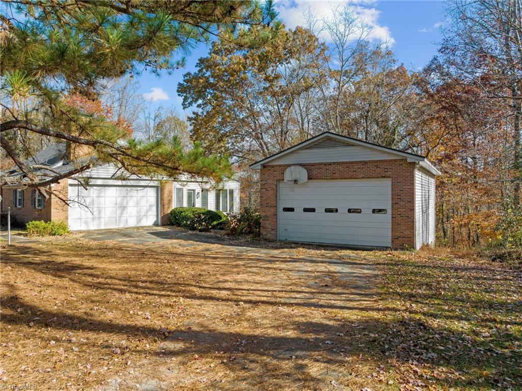 4532 Peeples Road Oak Ridge, NC 27310 - Photo 20 of 49 2 Car attached garage and Oversized 1 car detached garage/shop.