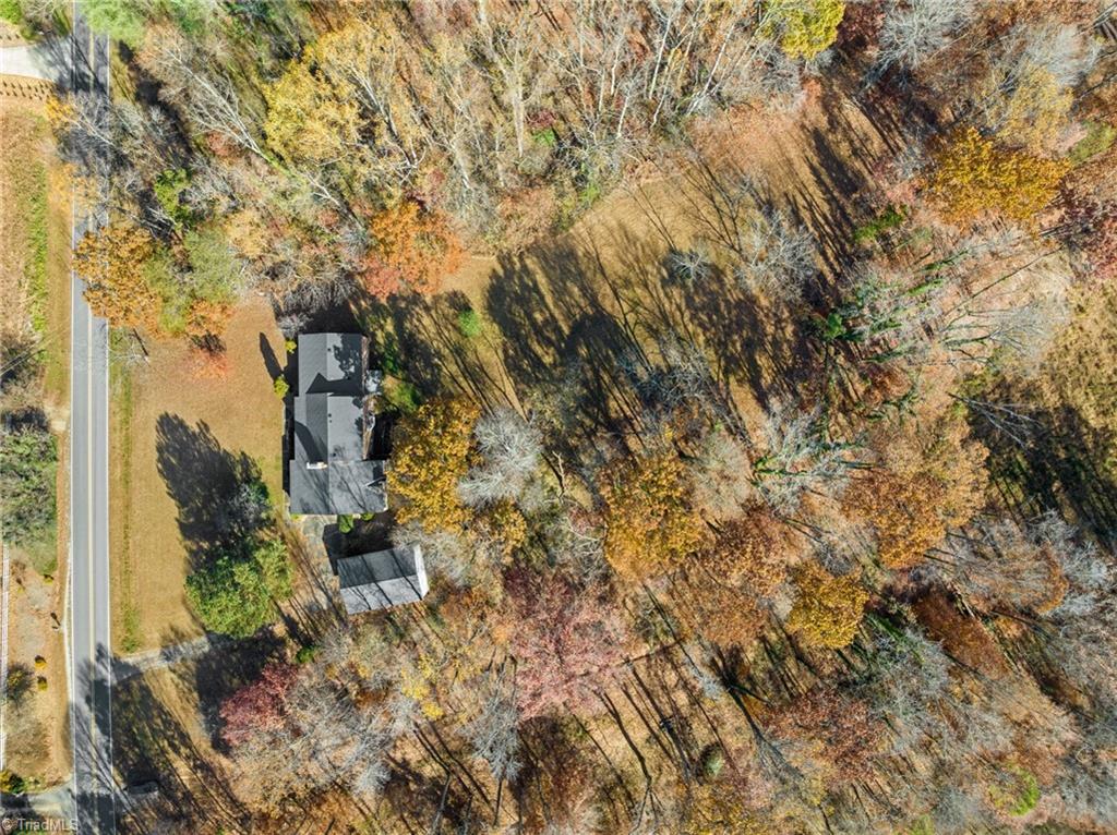 4532 Peeples Road Oak Ridge, NC 27310 - Photo 42 of 49 Overhead view showing wooded views.