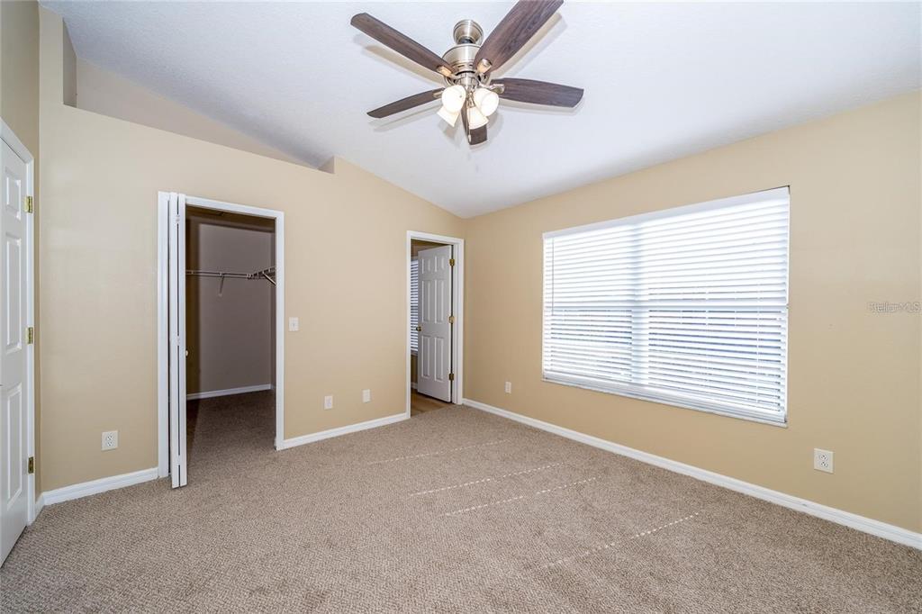 1238 Beckenham Way Wesley Chapel, FL 33543 - Photo 16 of 31 a view of an empty room with a window