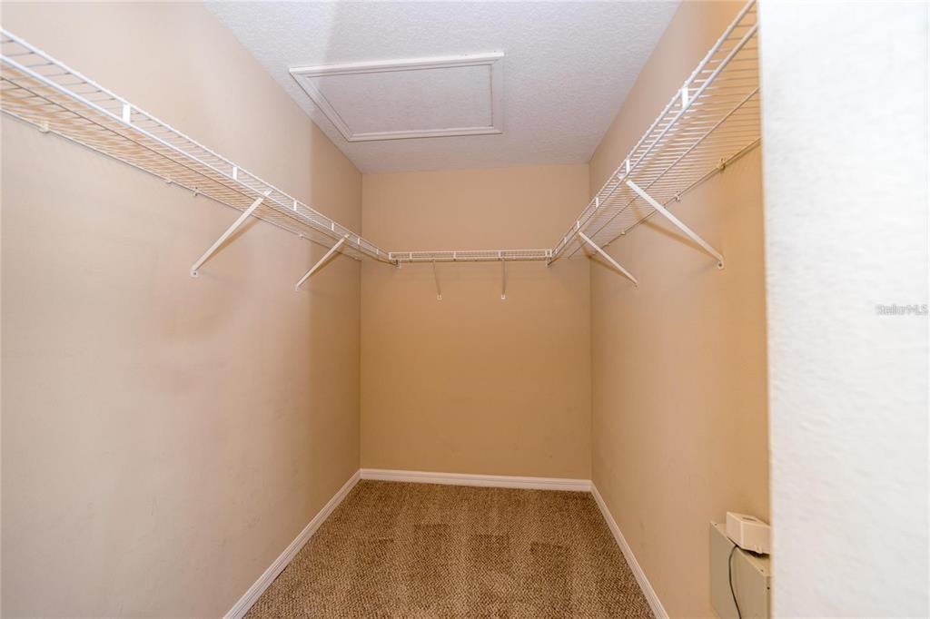1238 Beckenham Way Wesley Chapel, FL 33543 - Photo 17 of 31 a view of small space with racks on the wall