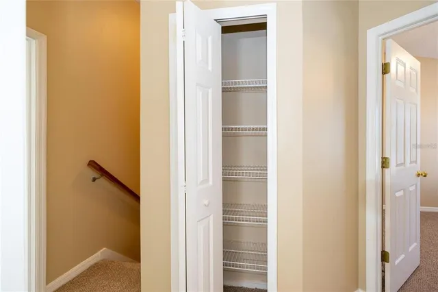 a aerial view of a house with a big yard