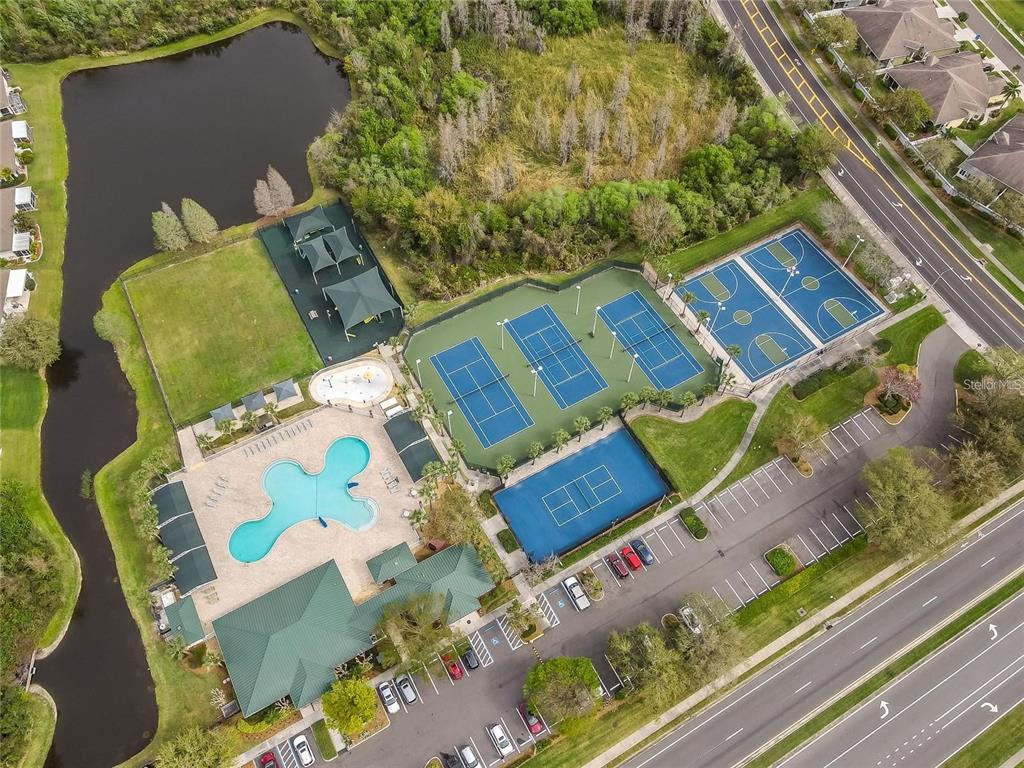 1238 Beckenham Way Wesley Chapel, FL 33543 - Photo 31 of 31 an aerial view of a house with a yard