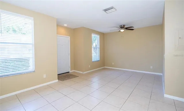 an empty room with windows