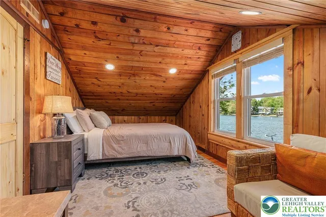 a bed room with a bed and a couch