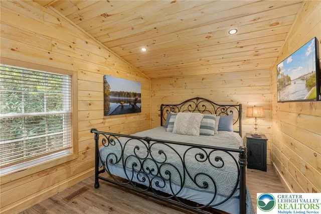 a view of a room with a wooden floor