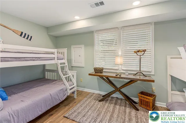 a room with a table and chairs