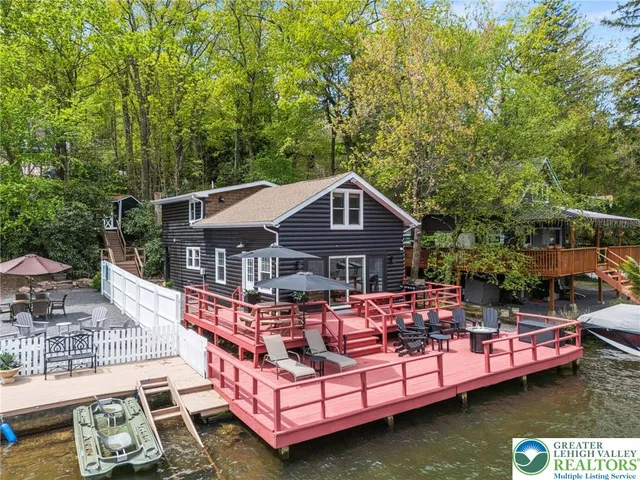 a front view of a house with swimming pool