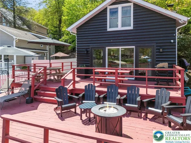 a view of a lake with a house in the background
