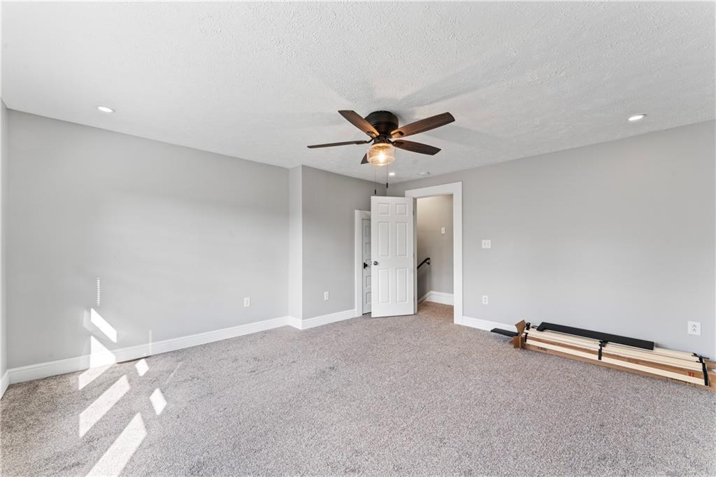 532 Park Road Ambridge, PA 15003 - Photo 28 of 37 a view of an empty room with a ceiling fan