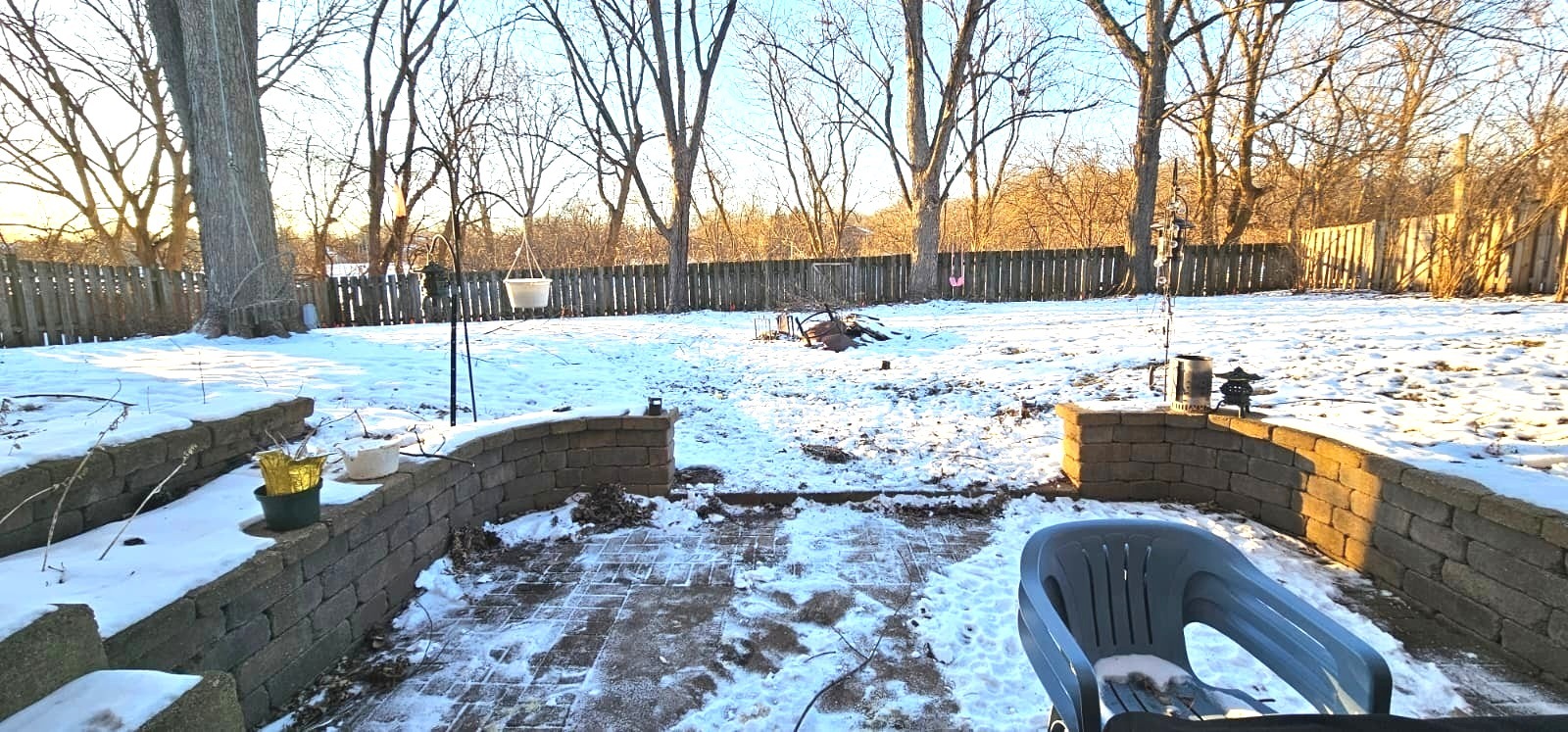 968 Coventry Lane Crystal Lake, IL 60014 - Photo 18 of 19 a view of a yard with a fire pit