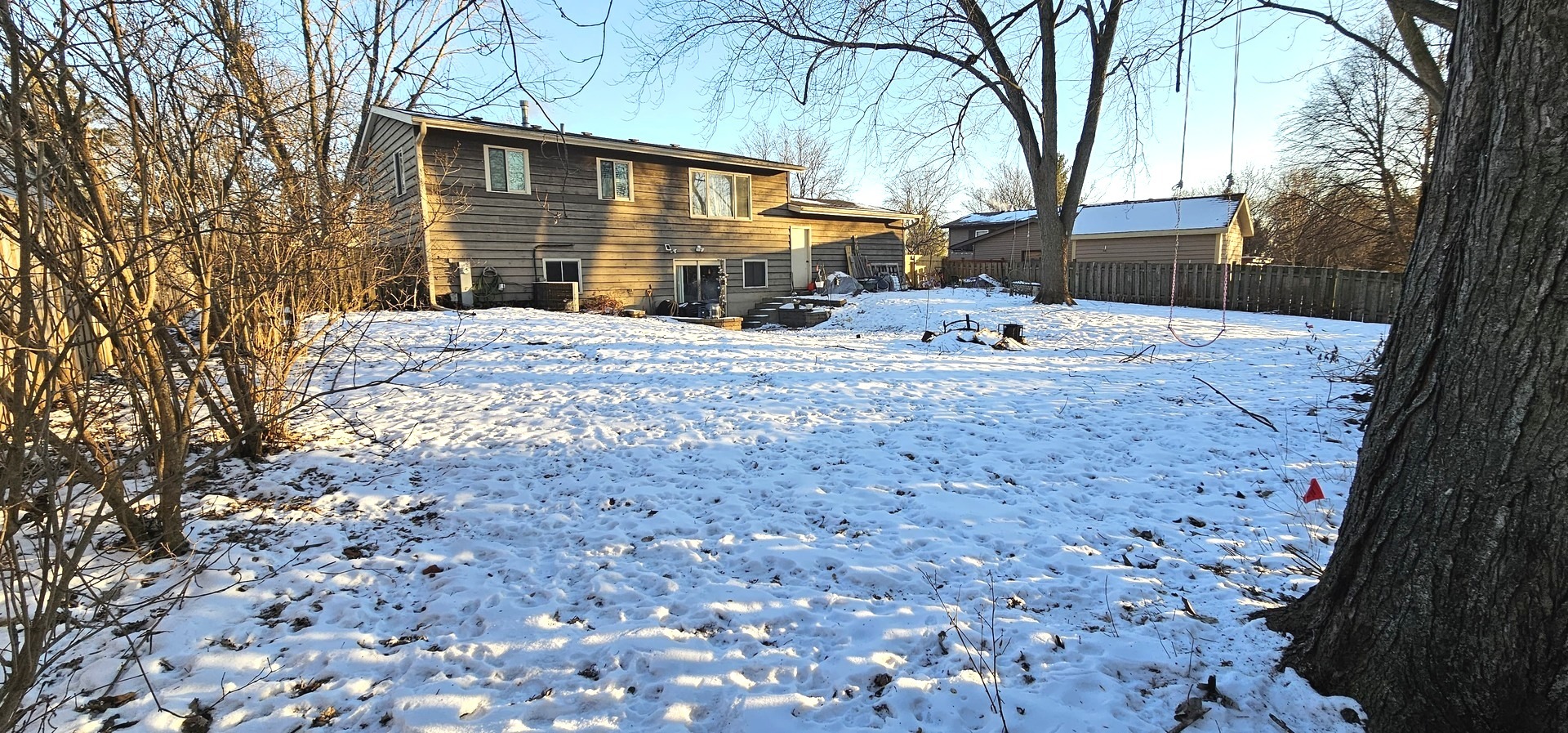 968 Coventry Lane Crystal Lake, IL 60014 - Photo 19 of 19 a view of a yard with a large tree