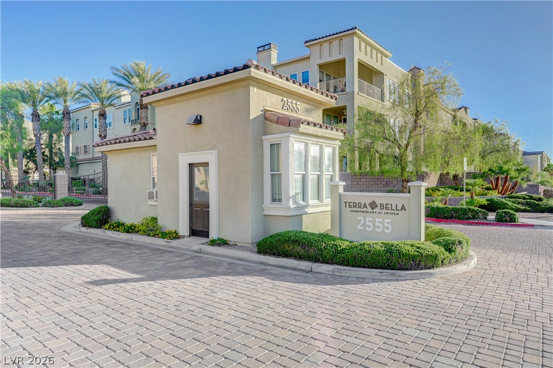 2555 Hampton Road, Unit 2207 Henderson, NV 89052 - Photo 49 of 74 A welcoming entryway with a guardhouse and neatly paved driveway leads to this secure community.