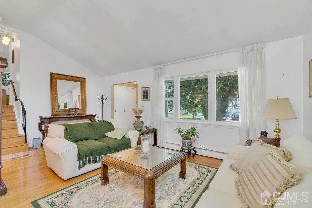 233 Amherst Avenue Colonia, NJ 07067 - Photo 15 of 56 a living room with furniture and a window