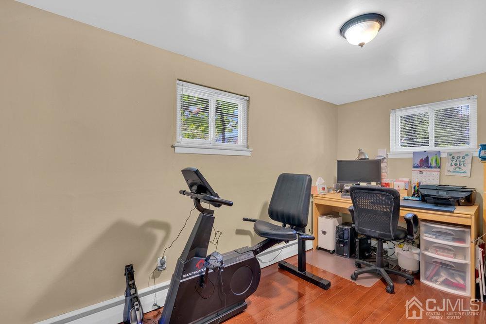 233 Amherst Avenue Colonia, NJ 07067 - Photo 32 of 56 a view of a workspace with furniture and a window