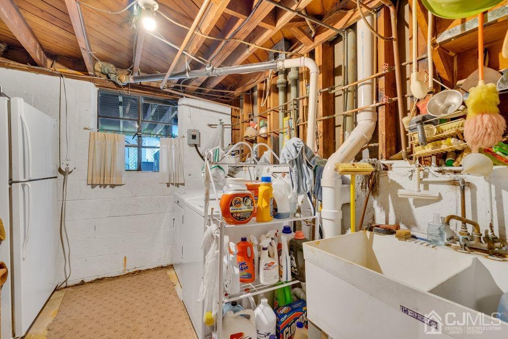 233 Amherst Avenue Colonia, NJ 07067 - Photo 38 of 56 a utility room with dryer and washer