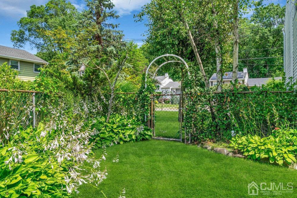 233 Amherst Avenue Colonia, NJ 07067 - Photo 43 of 56 a view of a garden