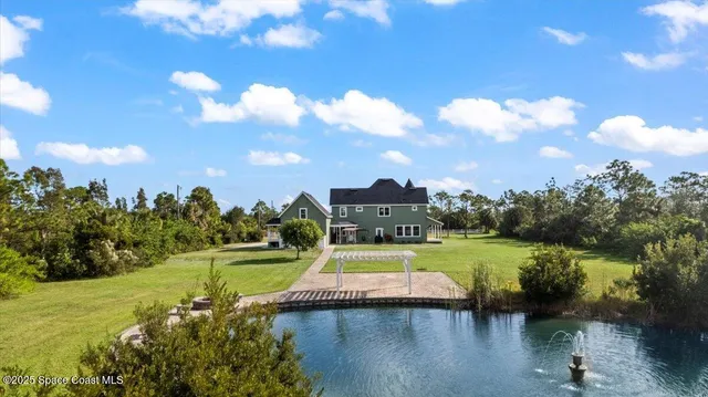 a view of a houses with a lake view
