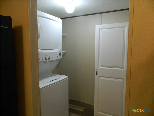 a view of a balcony with chairs