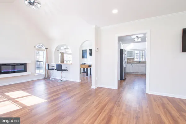 a view of a livingroom with wooden floor