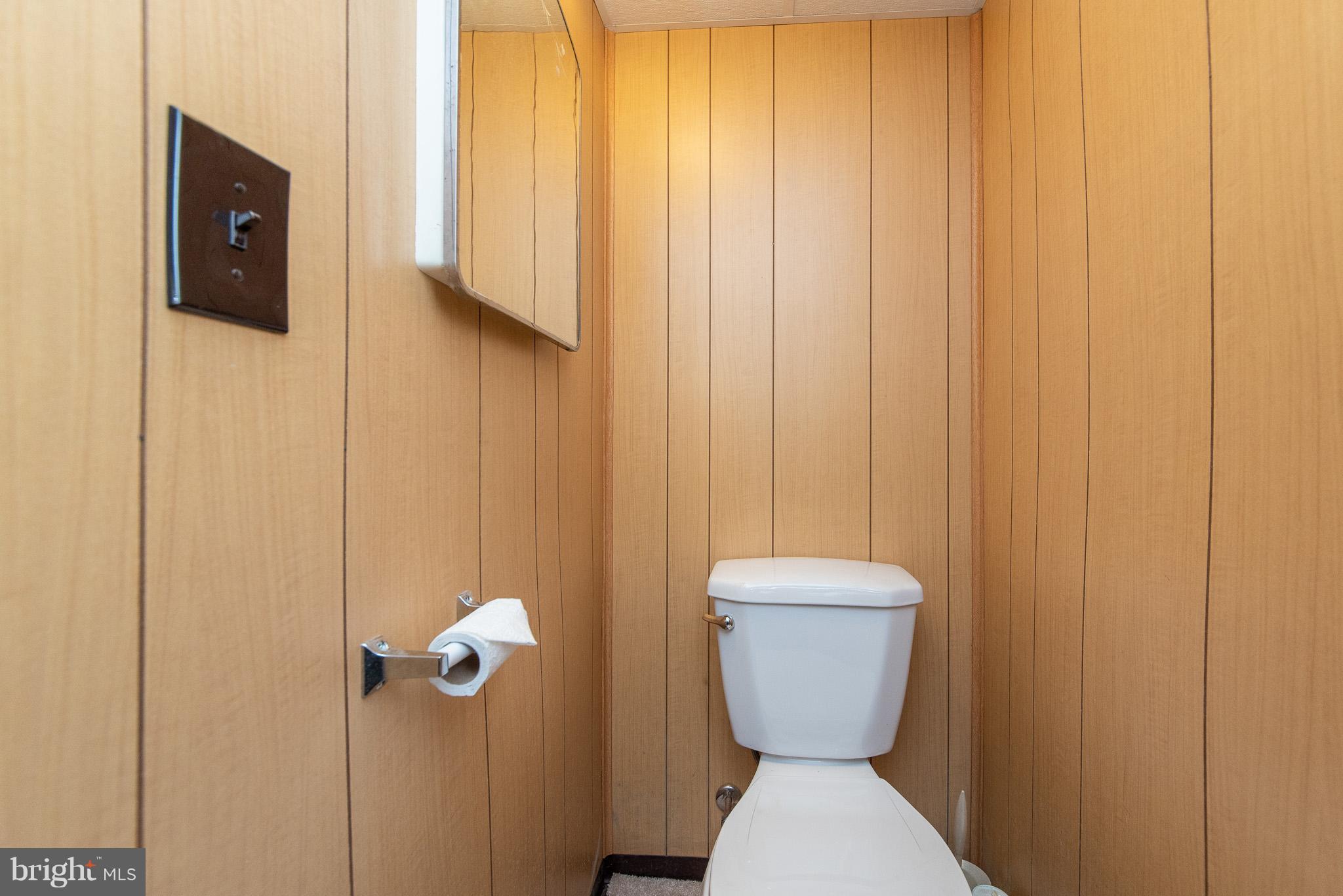 49 Hawthorne Road Baltimore, MD 21220 - Photo 28 of 31 a bathroom with a toilet and a sink