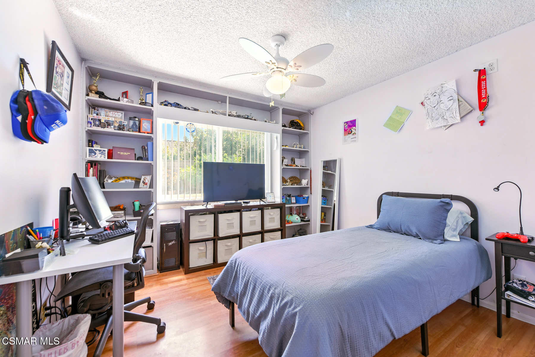 2238 Connell Avenue Simi Valley, CA 93063 - Photo 13 of 26 a bedroom with a bed and a flat screen tv
