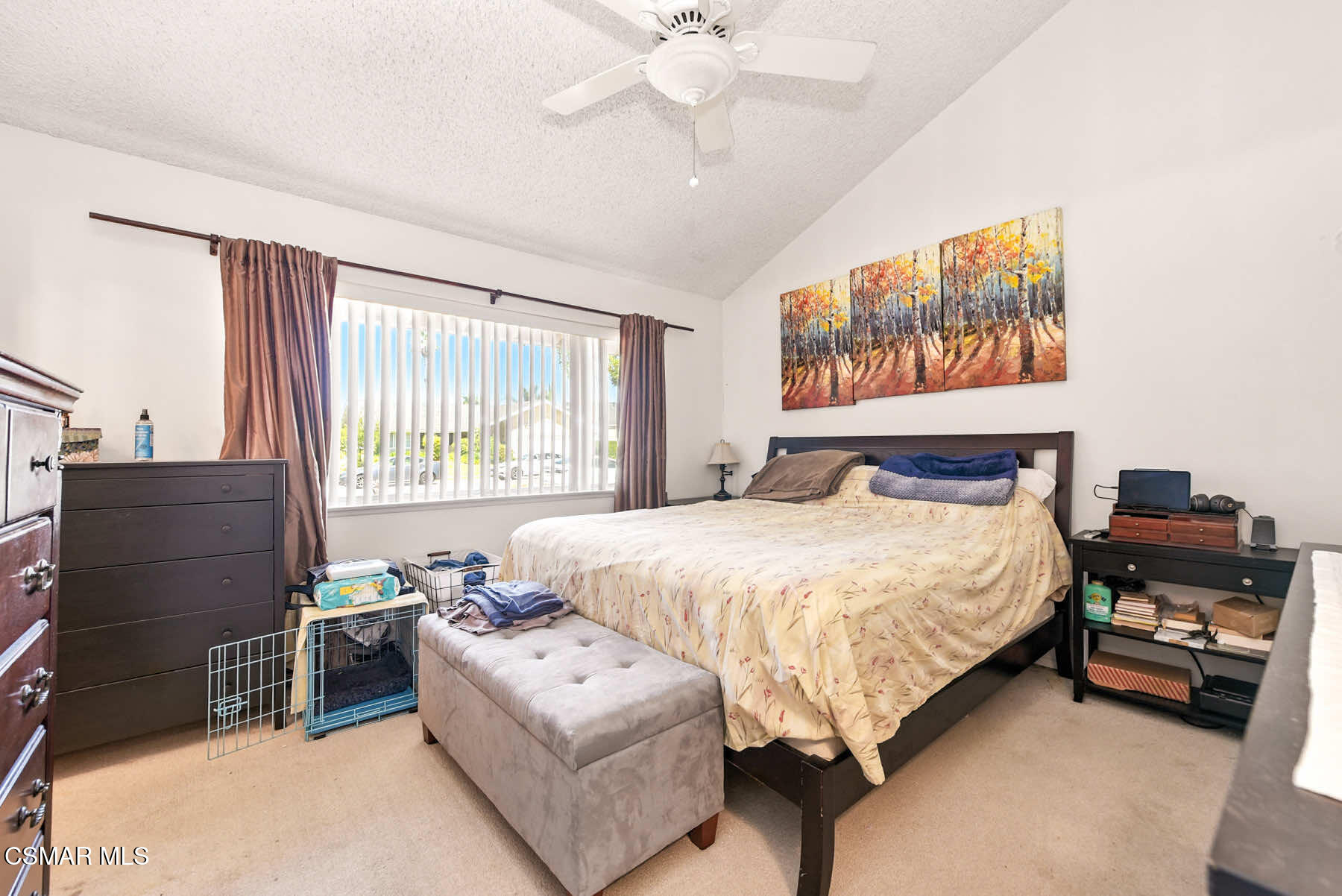 2238 Connell Avenue Simi Valley, CA 93063 - Photo 15 of 26 a bedroom with a bed and a chandelier