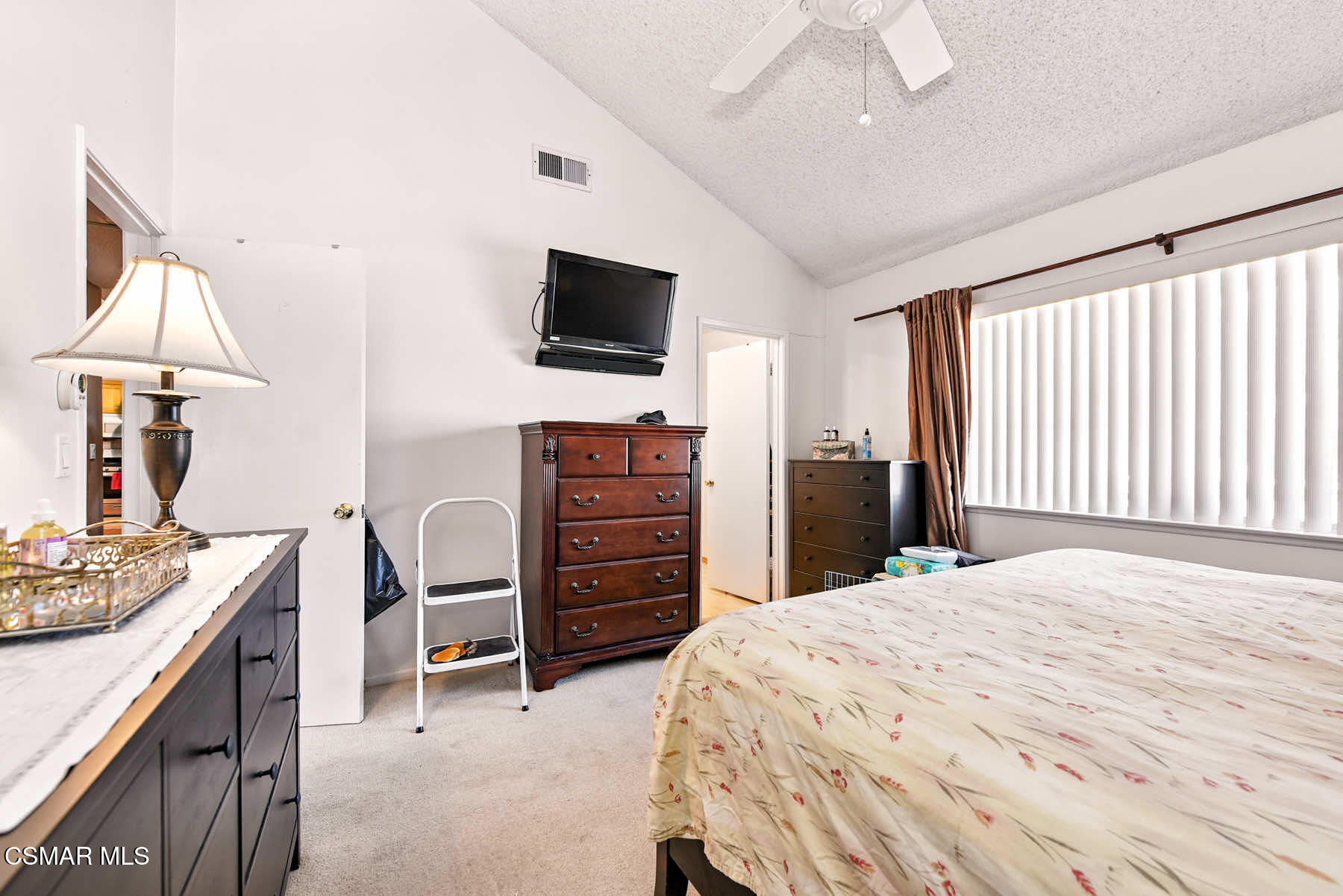 2238 Connell Avenue Simi Valley, CA 93063 - Photo 16 of 26 a bedroom with a bed and a flat screen tv