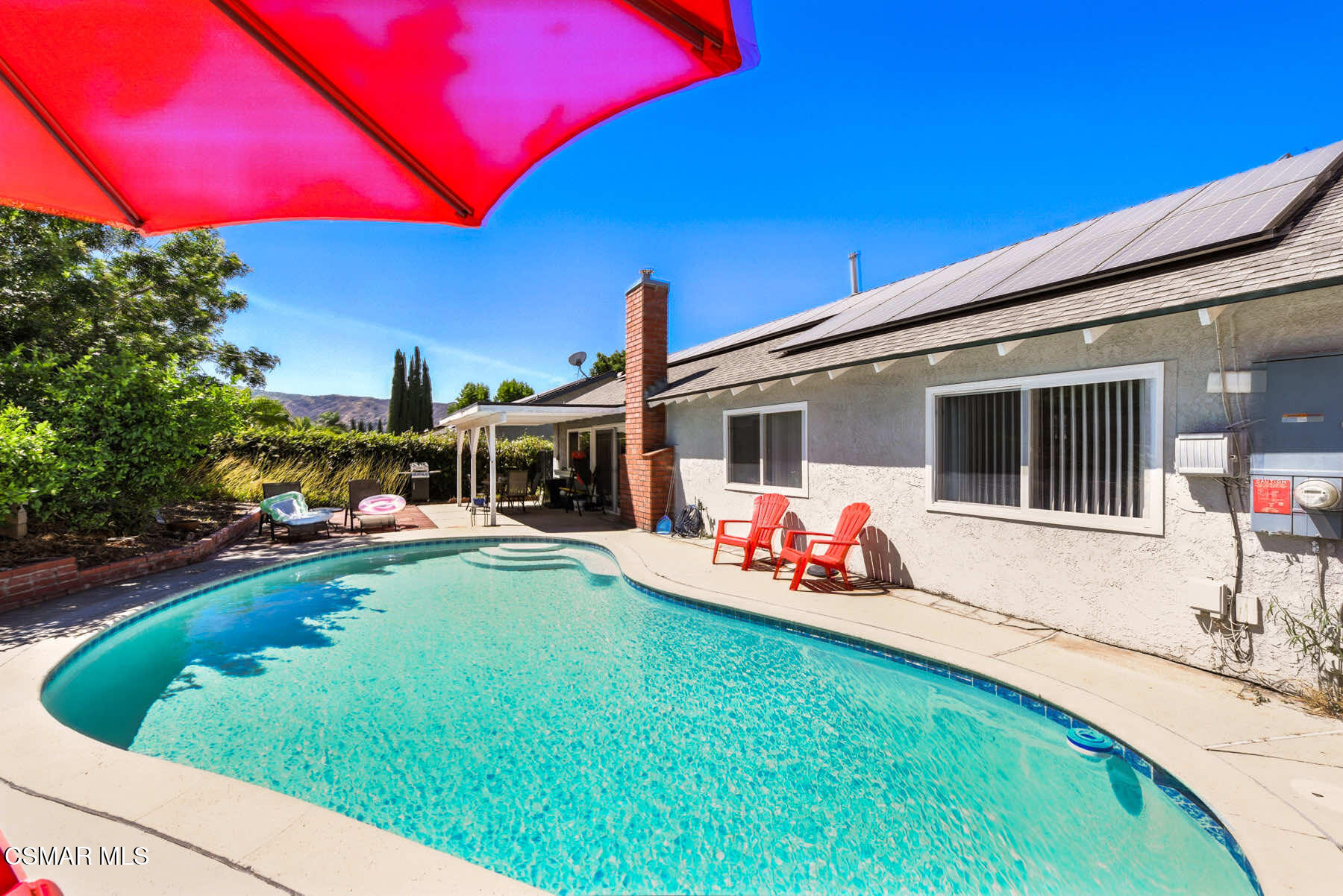 2238 Connell Avenue Simi Valley, CA 93063 - Photo 20 of 26 a front view of house with yard slide and outdoor seating