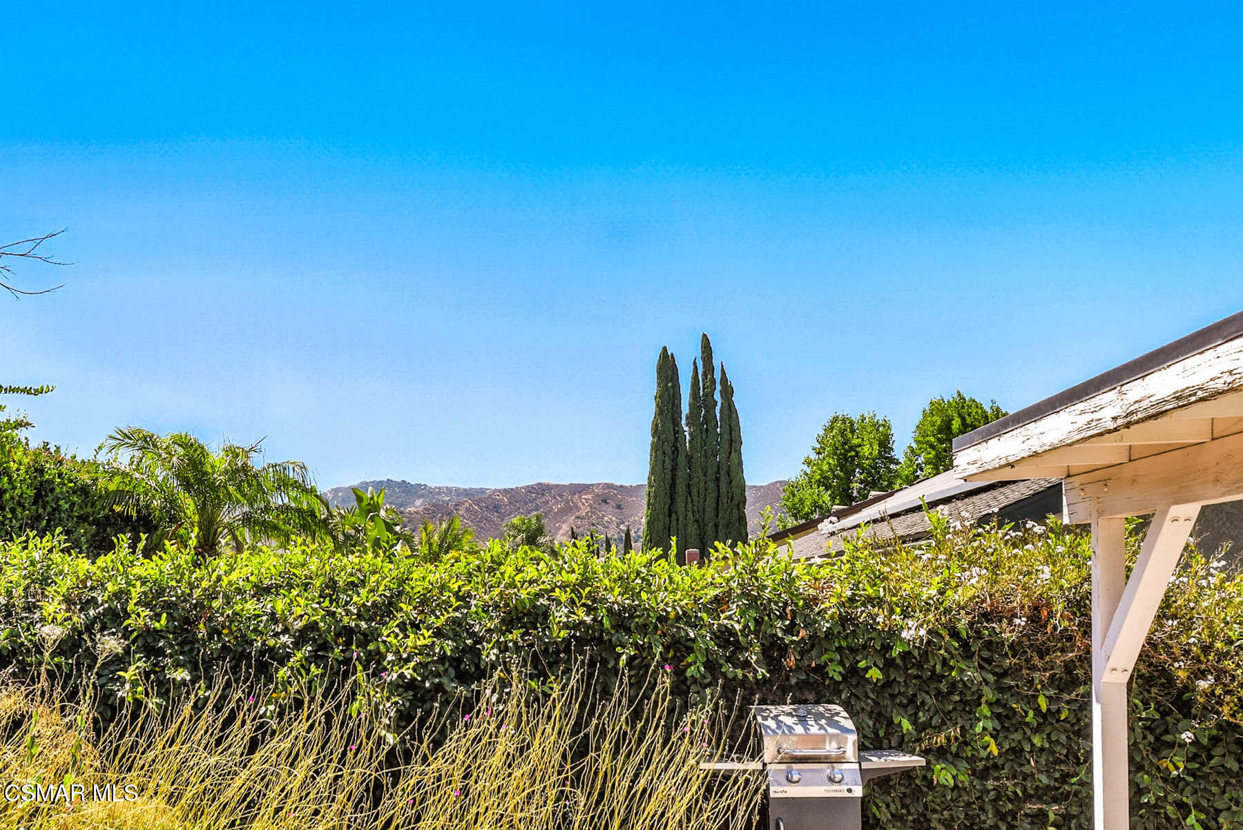 2238 Connell Avenue Simi Valley, CA 93063 - Photo 23 of 26 a view of a chair and table in the backyard