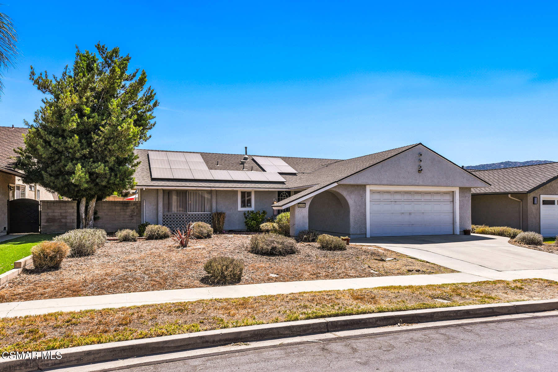 2238 Connell Avenue Simi Valley, CA 93063 - Photo 24 of 26 a front view of a house with a yard