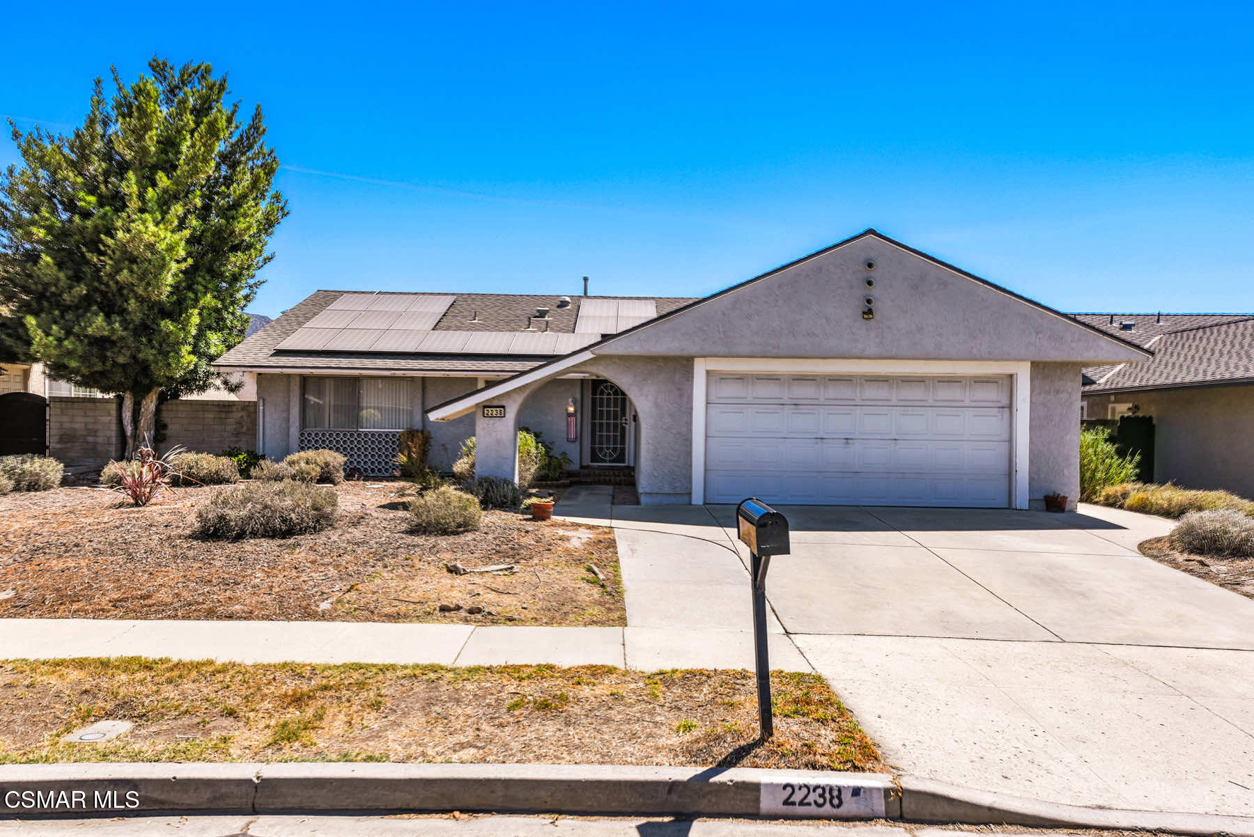 2238 Connell Avenue Simi Valley, CA 93063 - Photo 25 of 26 a front view of a house with a yard