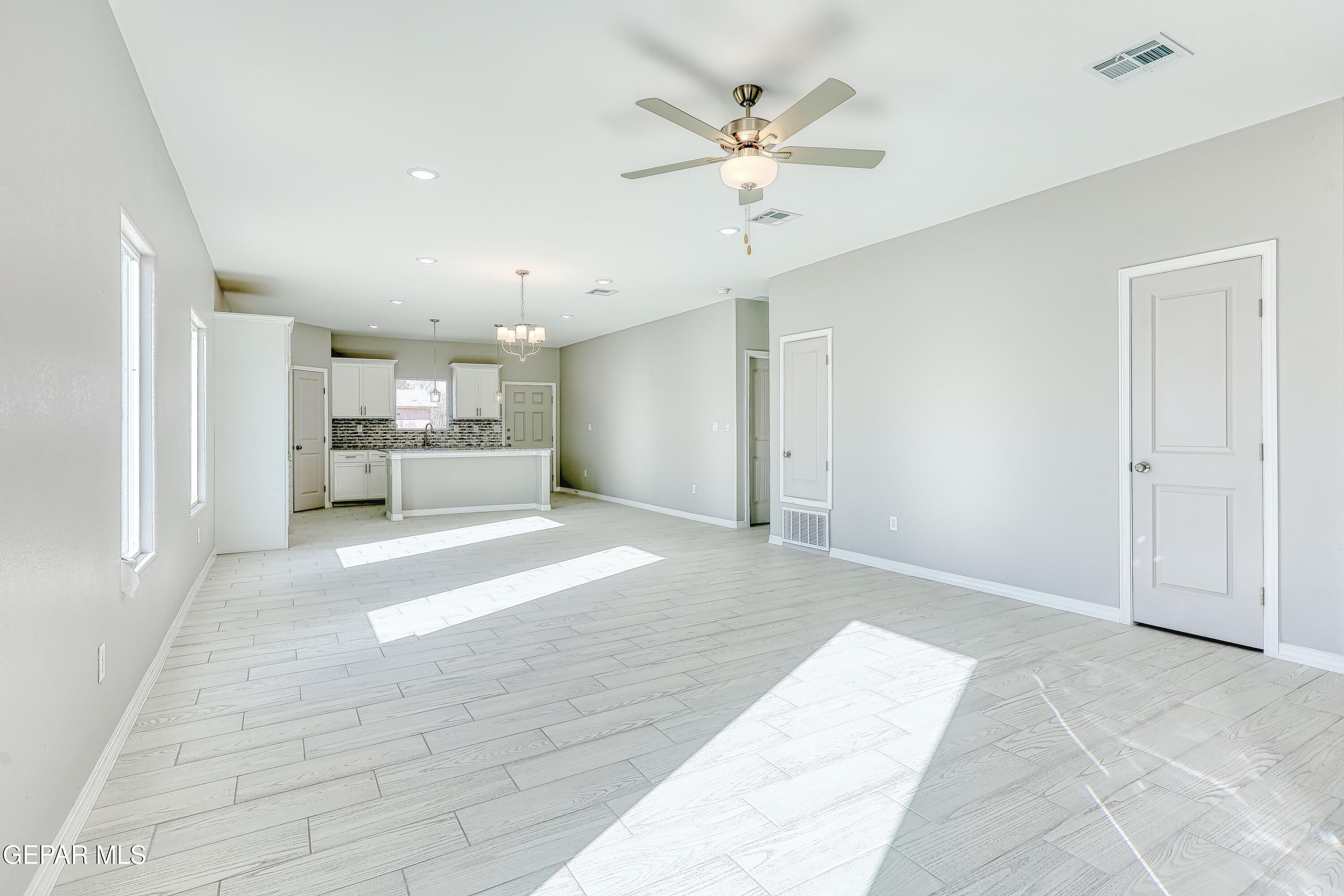 11607 Valle Bonito Road Socorro, TX 79927 - Photo 13 of 29 a view of a livingroom with a kitchen