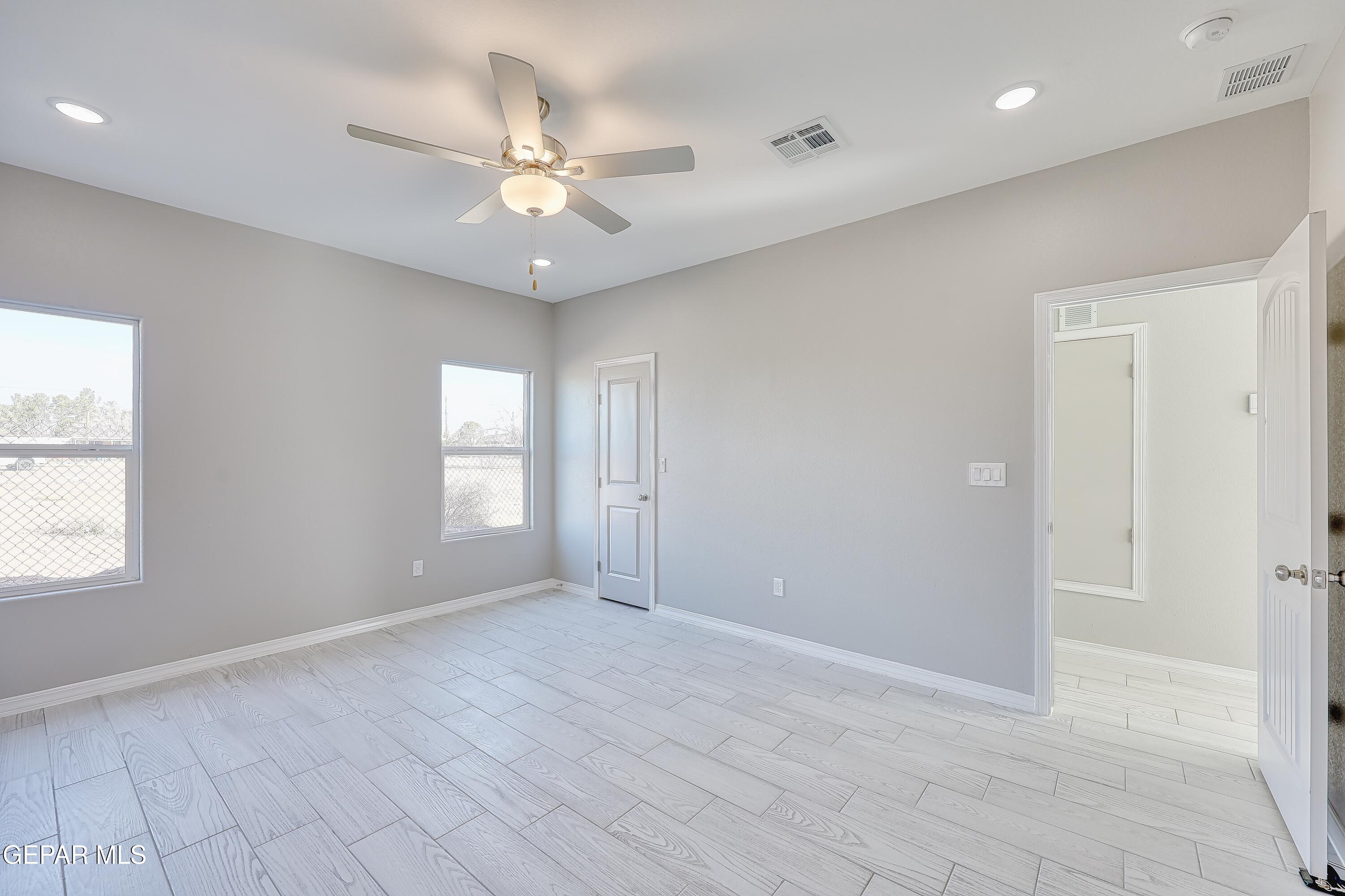 11607 Valle Bonito Road Socorro, TX 79927 - Photo 27 of 29 a view of an empty room with a window