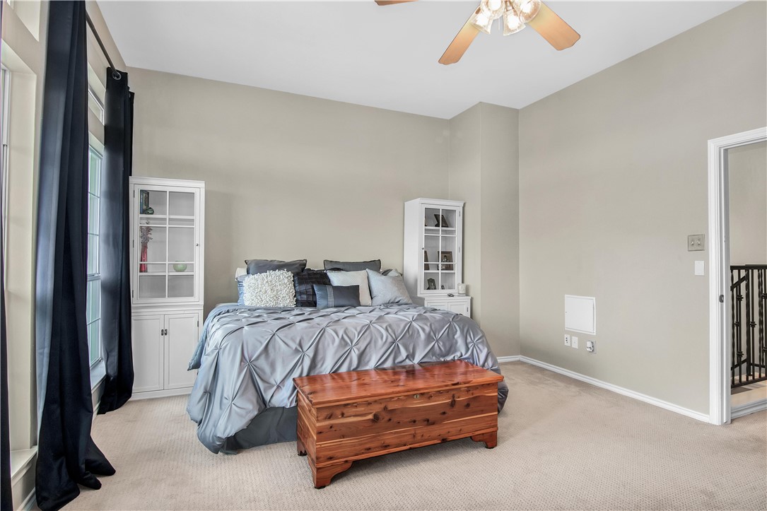 2918 Ranch Road 620 North, Unit W222 Austin, TX 78734 - Photo 16 of 30 a bedroom with a bed and a window