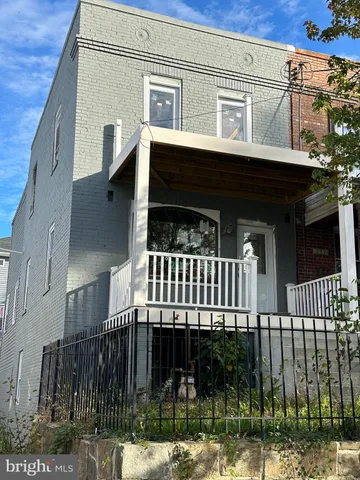 a front view of a house with a porch