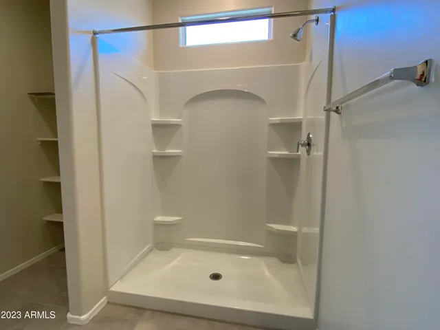 a bathroom with a bath tub