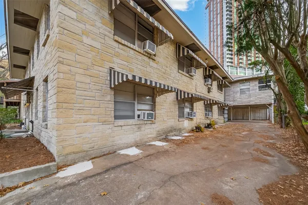 a brick building with a large windows