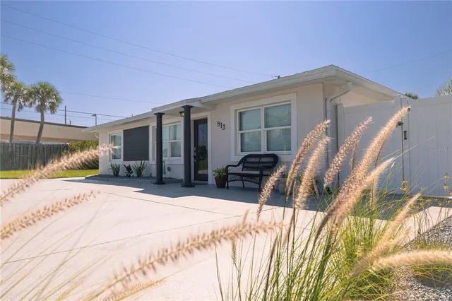 a view of a house with a patio
